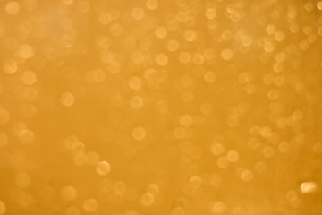Shimmering gold bokeh background.
