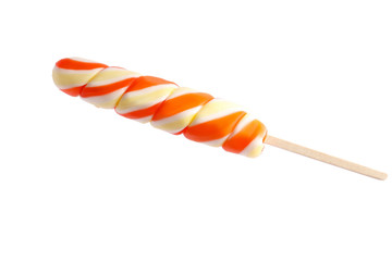 Caramel on a stick isolated on white background