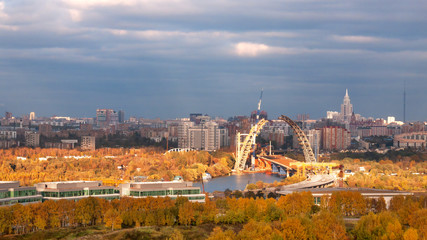 Construction of Zhivopisny (Picturesque) bridge.Panorama view from Krilatskoe district. Autumn cityscape. Moscow, Russia.