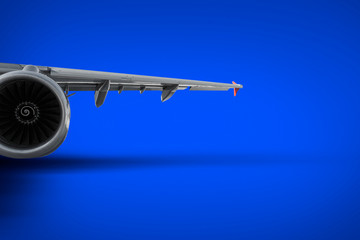 Engine and wing of a commercial air plane close up shot.