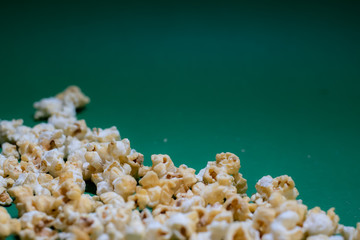 Popcorn on a green background
