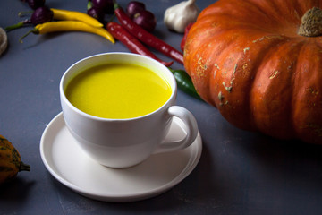 Pumpkin asian coconat cream soup. Autumn hot food