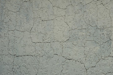 Background.Structure.The texture of the cracks and lines of the old plaster.