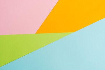 texture background of fashionable pastel color with top view, minimal concept, flat lay: blue, orange, green and pink