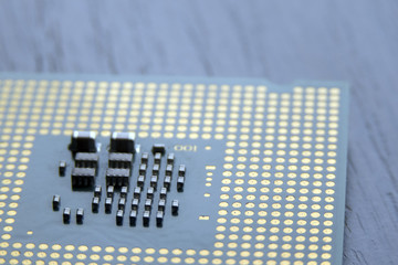 processor chip lie on wooden table