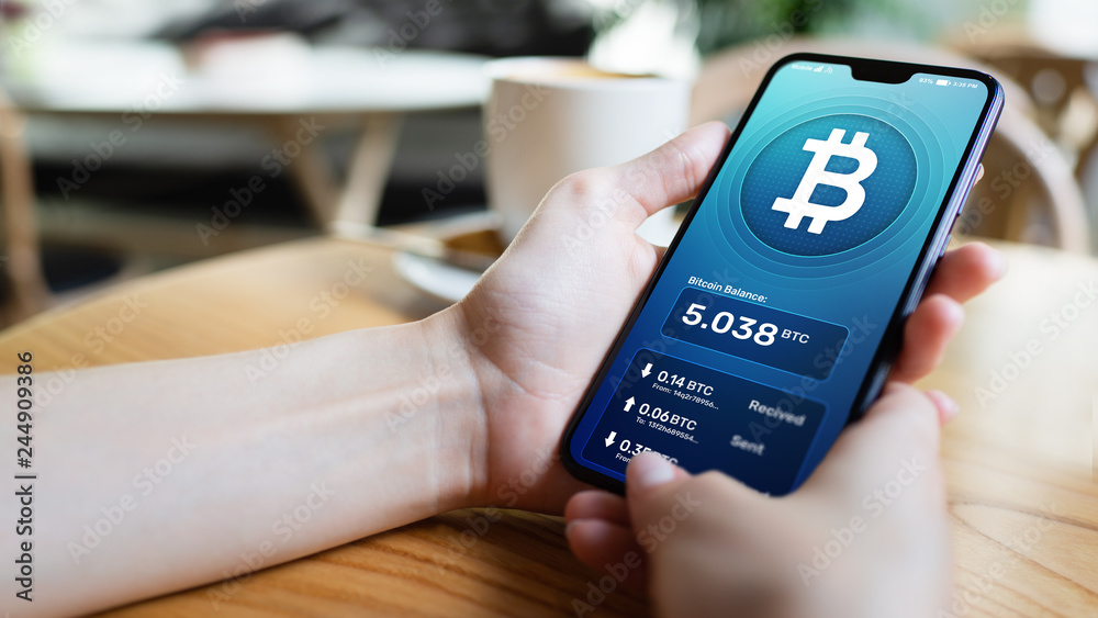 Wall mural bitcoin wallet interface on smartphone screen. cryptocurrency payments and blockchain technology bas