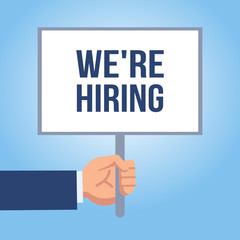 Hand holds signboard. We are hiring, recruitment poster. Flat design vector illustration