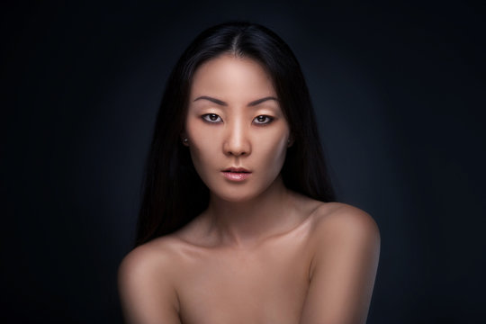Beautiful brunette asian woman portrait