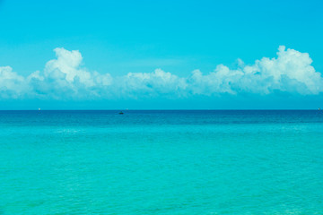 light blue sky over ocean