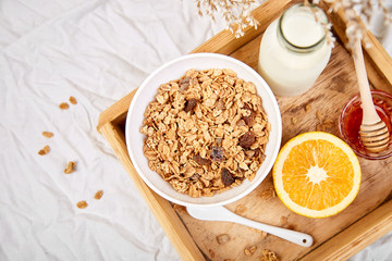 Good morning. Breakfast on white bed sheets.