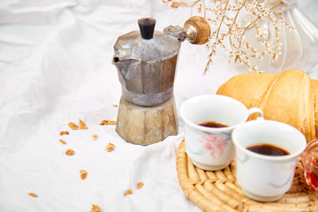 Good morning. Two cup of coffee with croissant and jam.