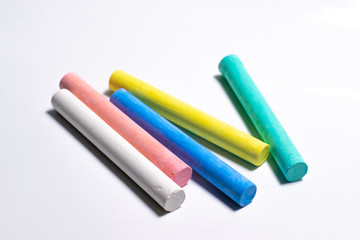 colored chalk for drawing on a white background