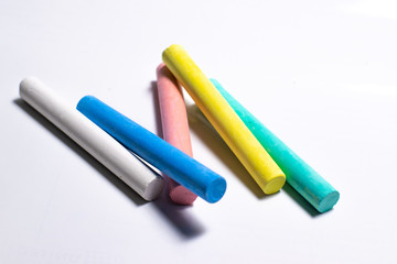 colored chalk for drawing on a white background