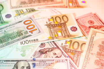 Dollars and euro bills background. Close up cash money.
