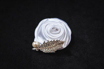 Grooms white rose style pinhole corsage  
