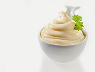 Twirled spicy mayonnaise served in a spoon