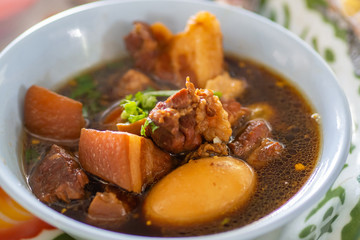 Close-up of Egg and Pork in sweet brown Sauce.