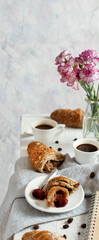 Breakfast with coffee and croissant