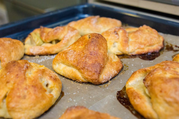 taste cakes or buns, lying on the  tray