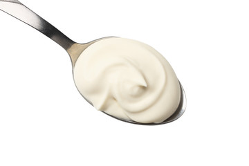 sour cream in spoon isolated on white background