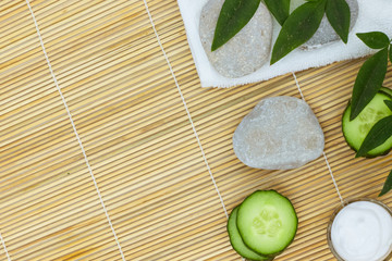 Natural Skin Care Products. Top view ingredients on table concept of the best all natural face moisturizer. Spa stone and white towel	
