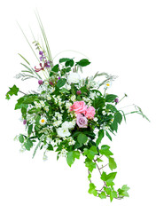 spring floral decoration with roses roses, green leaves and wild herbs, bouquet with  diagonal structure on white background