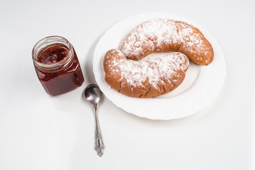 croissants with saucer waiting on a white background