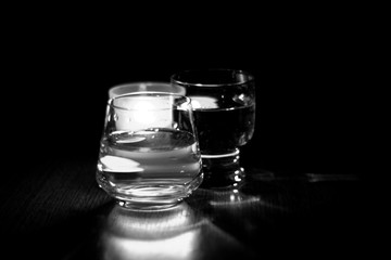 beautiful glasses in the flame of a candle