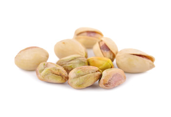 dried pistachios on white background