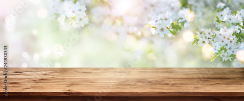 Spring blossoms with wooden table