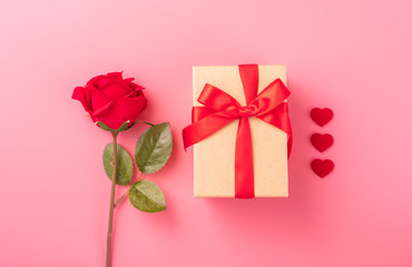 Giving present and celebration concept at Valentine's day, anniversary, mother's day and birthday surprise on pink background, copyspace, topview