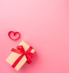 Giving present and celebration concept at Valentine's day, anniversary, mother's day and birthday surprise on pink background, copyspace, topview