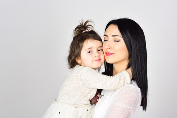 Mother and daughter. Mothers day. Childrens day. Happy woman with little girl. Beauty and fashion. Love and family. Looking trendy. It is not easy to be a working mom. Pure happiness