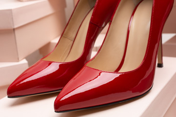 New red leather high heel shoes on the box