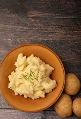 Vertical image of a bowl of mash potato with copy space 