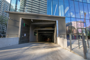 The entrance to the garage under the skyscraper