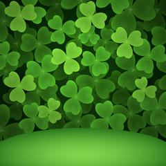 Shamrock field background. Green leaves of clover and hill. Can be used for topics like symbol of Ireland, Saint Patrick day, luck