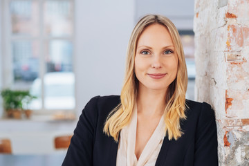 Attractive young businesswoman with a quiet smile