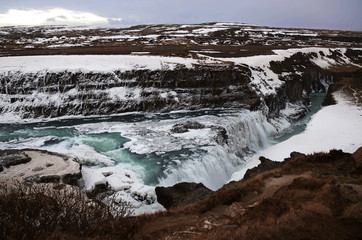 Glacial river of Iceland from blue water amid lava fields
