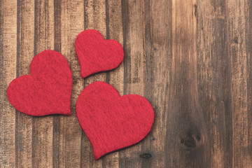Red hearts with wooden background, valentine's background