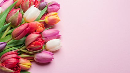 Colorful bouquet of tulips on white background.