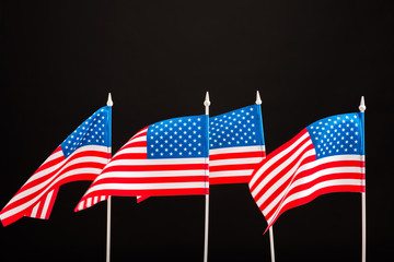 background of american flags isolated on black