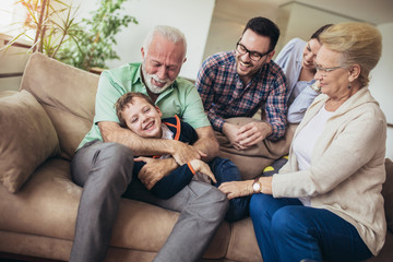 Portrait of a three generation family spending time together at home.