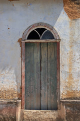 old wooden door in wall