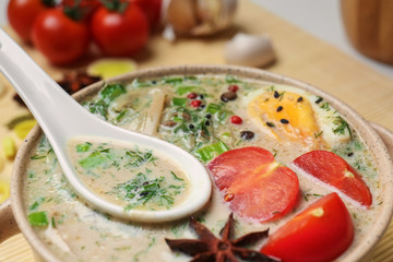 Tasty Chinese soup in pot, closeup