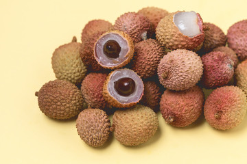 Fresh Organic Lychee Fruit in a Yellow Background Tasty Fruits Close Up Horizontal
