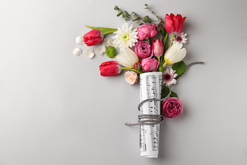 Bouquet of beautiful flowers on light background