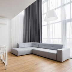 Home interior with corner sofa