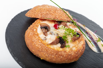 homemade mushroom soup in a bread bowl