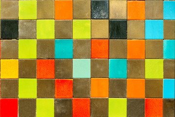 Colorful vintage style ceramic tiles wall decoration, close up tiles wall background